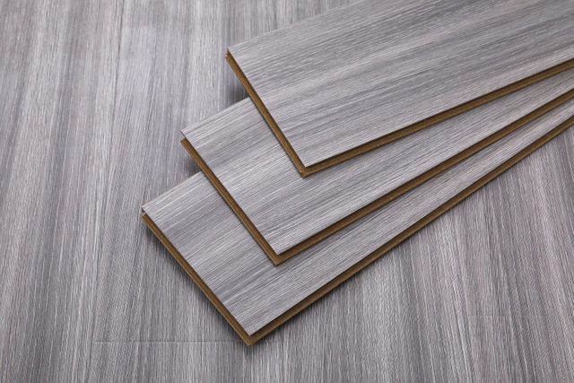 Plancher en bois stratifié à usage intérieur Revêtement de sol stratifié AC3AC4AC5 en papier de bois résistant à l'usure